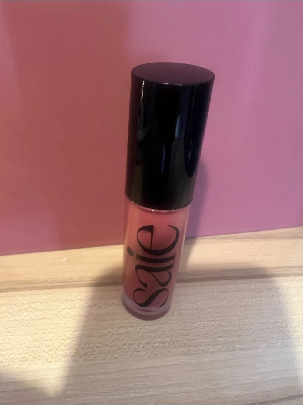 Saie glossy bounce lip tint.    Shade bounce (mauve) NEW